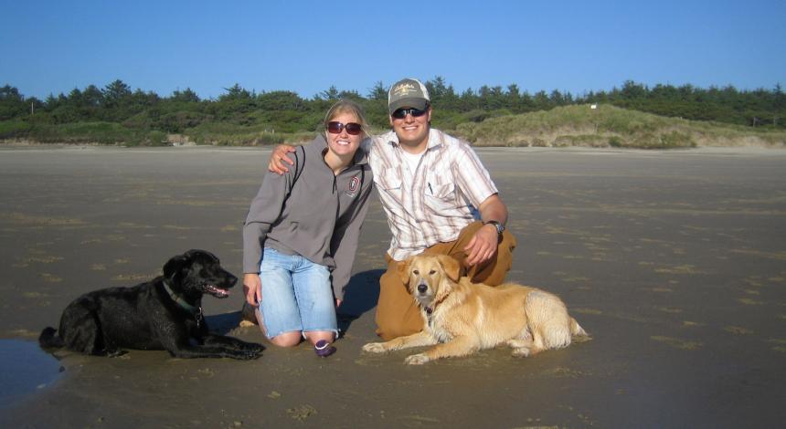 Shanna (Reitmann) Sallee on the beach with her husband