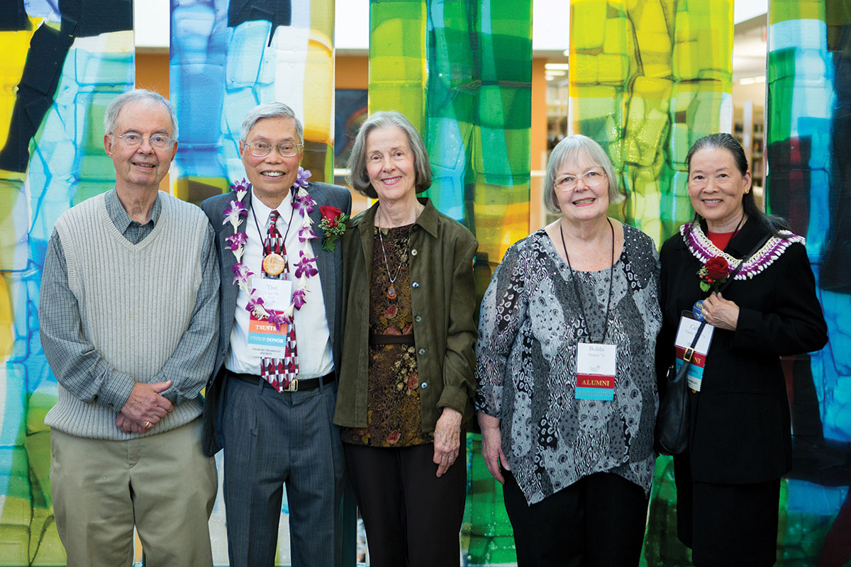 Tim Tran and friends celebrate the Library Dedication
