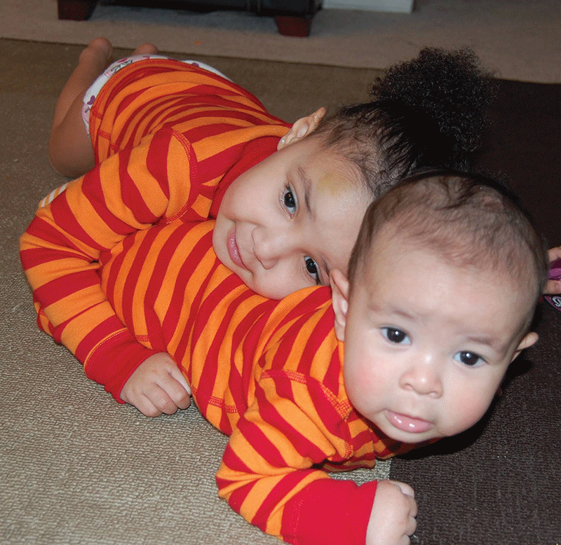 Jada and Jordan laying down together.