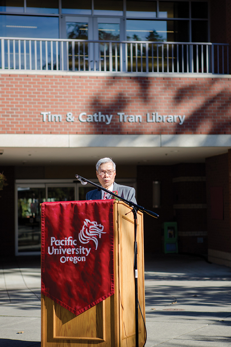 Tim Tran Standing at the Library Memorialization