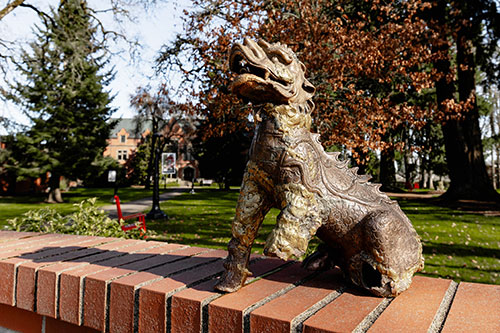The original Boxer statue on wall in front of Forest Grove Campus.