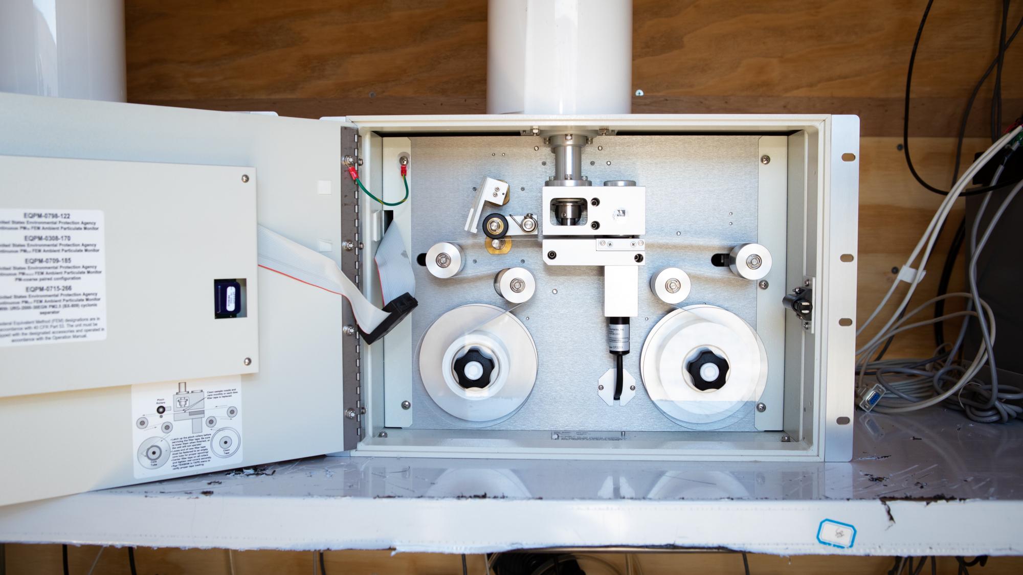 Open beta attenuation mass (BAM) monitor