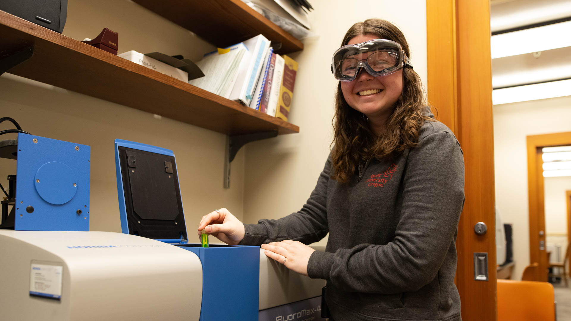 Student with Fluorimeter