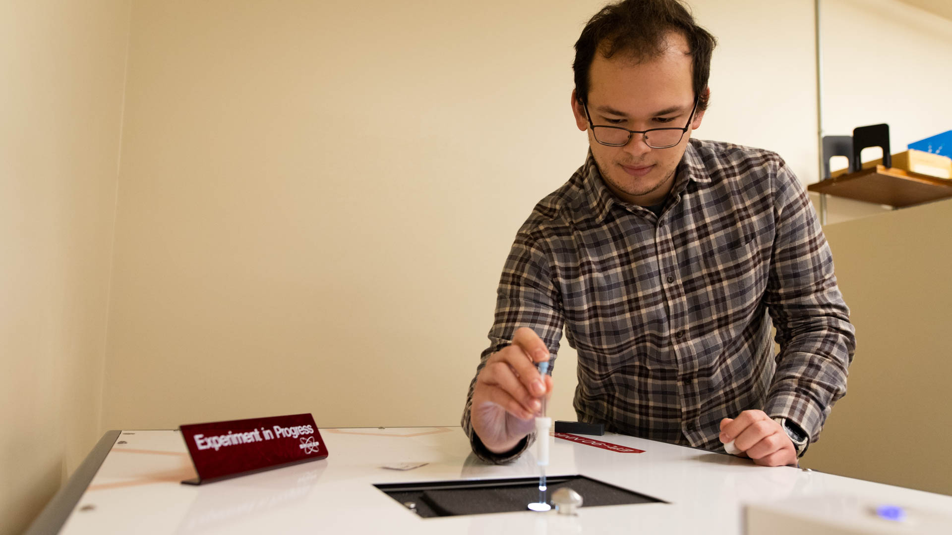 Student with NMR Spectrometer