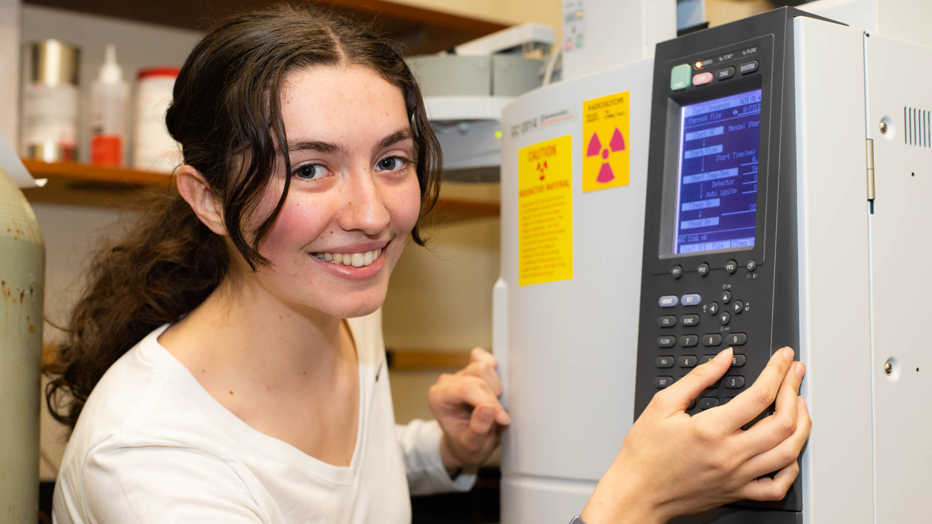 Student with Flame ionization Detection and Electron Capture Detection machine