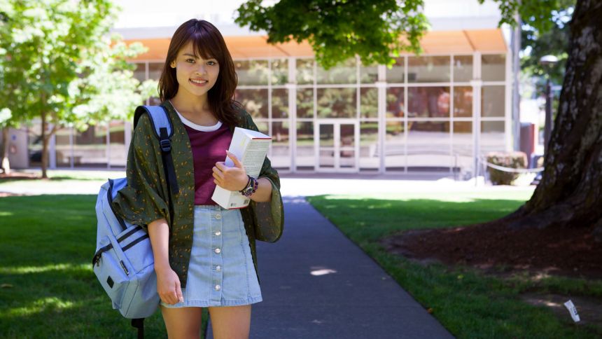 Student standing outside on Forest Grove campus
