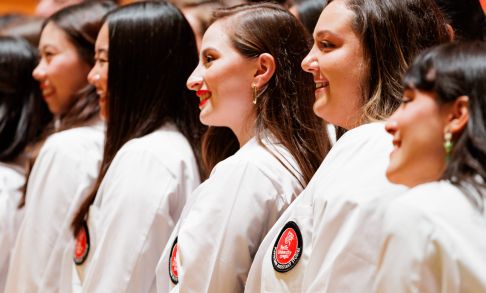 Pacific healthcare students attend their white coat graduation ceremony.