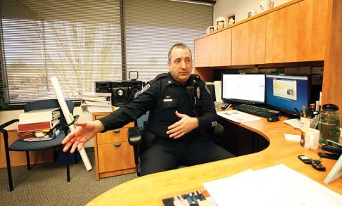 Captain Jeffrey Williams working in his office.
