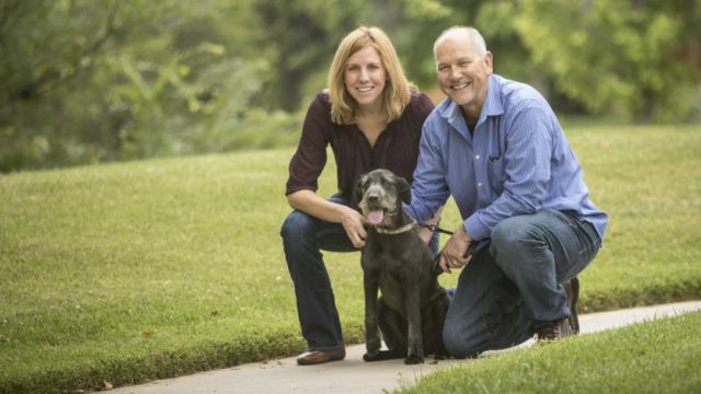 Kres and Amy Pedersen pictured together with their dog