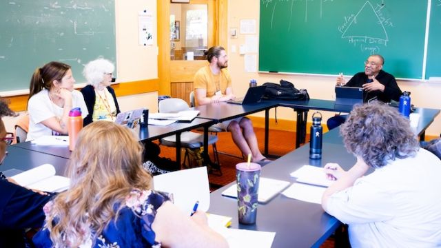Writer Kwame Dawes teaches a class in Pacific University's MFA program