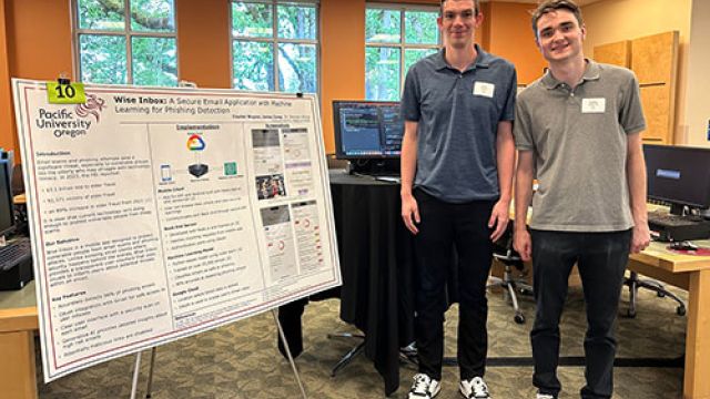 Cayden Wagner '24 (right) and James Corety '24 with their poster presentation on Wise Inbox at the 2024 Senior Projects Day.