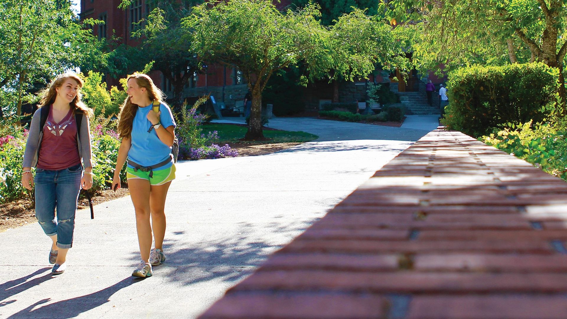 Students walking on a sidewalk