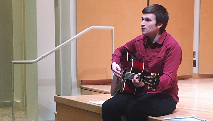 Jamie Anderson with guitar